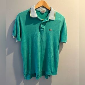 Men’s Vintage Lacoste polo shirt.  No size on tag but appears to be a Medium.